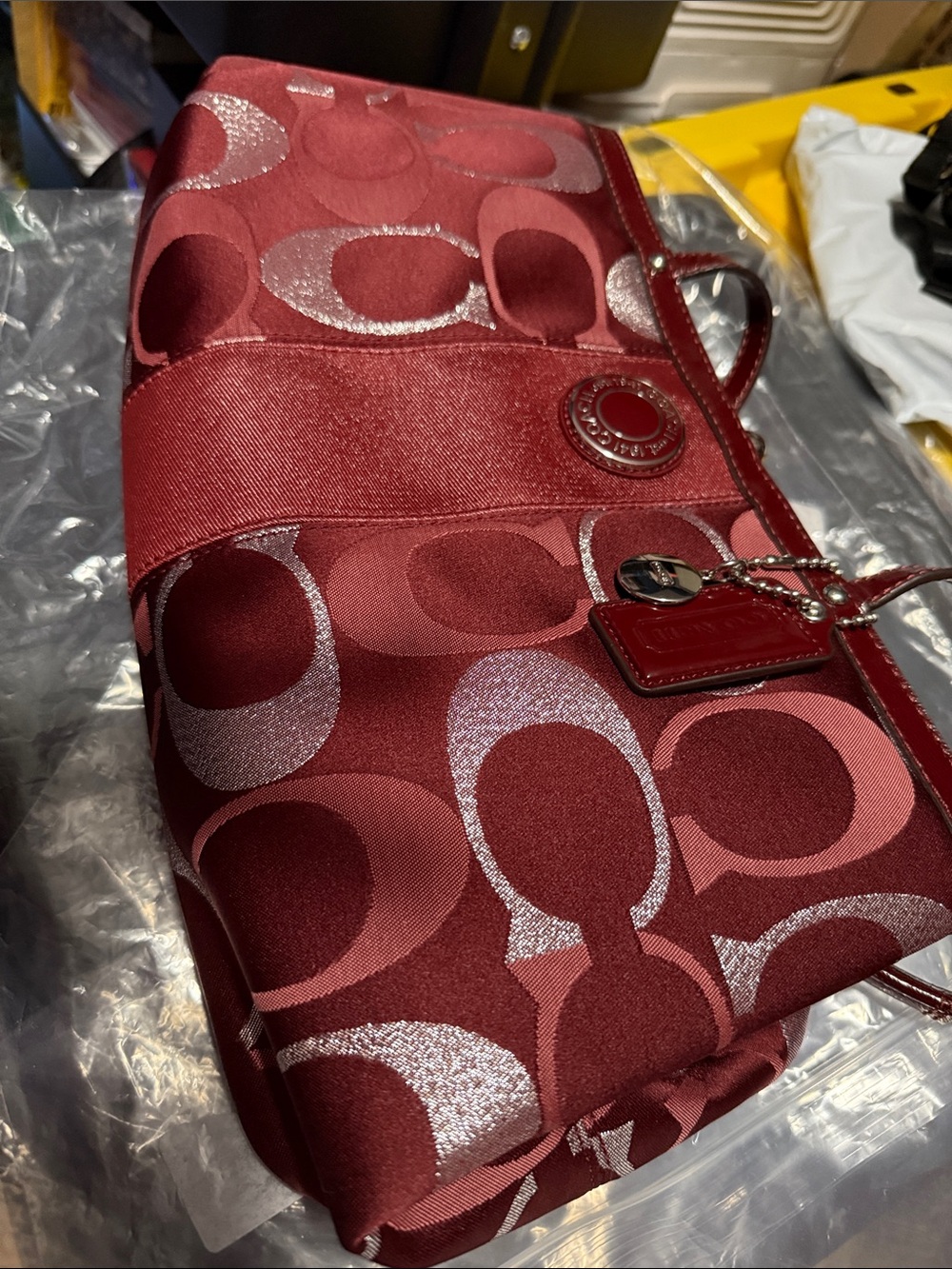 Coach Satin Signature Kisslock Shoulder Bag in Deep Wine and Metallic Accents